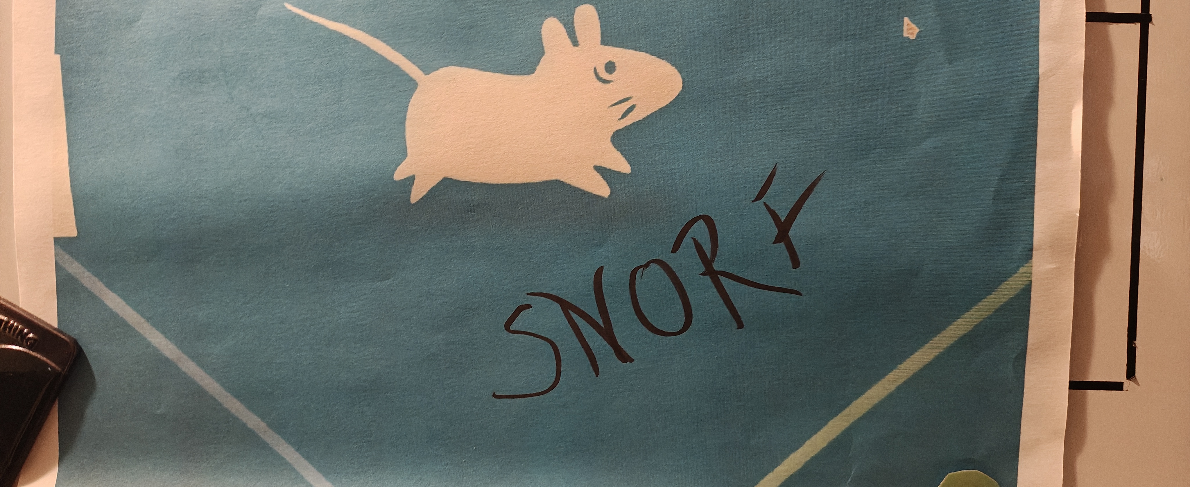 A printout of Snorf on the whiteboard.